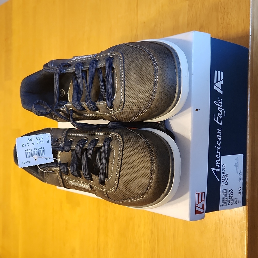 Youth Size 4.5 American Eagle grey tie shoe. Brand new, tags and in box.